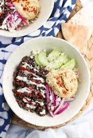 Spiced Beef Hummus Cucumber Slices Yogurt Sauce Pickled Red Onion And Feta Are Served Over Brown Rice Beef And Rice Healthy Entrees Beef Rice Bowl Recipe