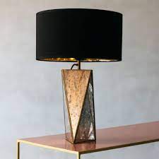 The navy blue matte finish on the ceramic body is rich against the bright gold base, while the crisp shade zips the whole lookup. Lamps Small Gold Table Lamp Table Lamp Price Floor Lamps Sale Nightstand Table Lamps Pretty Bedside Table Mirror Table Lamp Modern Table Lamp Table Lamp Sets