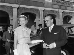She wore her hair curled and to the side and showed off glamorous earrings. Grace Kelly Wedding Death Children Biography