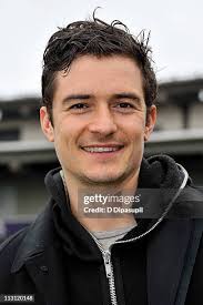 Actor Ethan Hawke heads the ball during a celebrity soccer match at... News  Photo