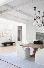 Rustic Wood Dining Table With Slipcover Dining Chairs Mixing Casual With Formal White Wal Luxury Dining Room Dining Room Inspiration Wood Dining Table Rustic