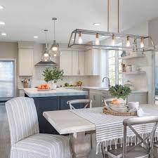 Farmhouse dining tables are often made of wood to give them a rustic country look. 20 Modern Farmhouse Dining Rooms That Will Transport You To The Countryside