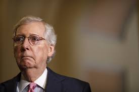 Actor Adam Scott and Sen. Mitch McConnell's social media team are in a  Twitter fight