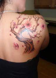 This cherry blossom tree tattoo looks more chinese than japanese, perhaps due to the chinese style lantern that accompanies it. 150 Cherry Blossom Tattoos Meanings Ultimate Guide 2021