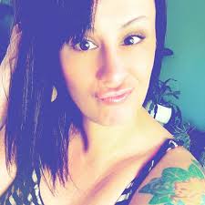 Two-tier live edge desk, stained grey, with hairpin legs. Includes gently  used chair. Measures 46” wide by 21” deep by 30” high at desk and 36” high  at back shelf. Price is