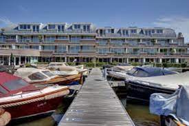 Is drinking a heineken by heineken at kaag resort. Luxury Short Stay Apartments At A Great Waterside Location