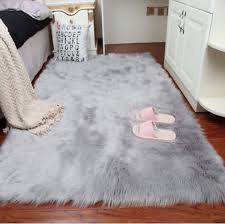But then they get sat on, walked on and — after no time at all — just generally gunked and matted up. Faux Fur Grey Rug Fur Rug Bedroom Faux Sheepskin Rug Room Carpet