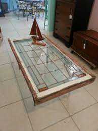 It is ideal for small spaces, as glass produce a spatial illusion, making a small living room larger than it actually is. Salvaged Leaded Stain Glass Window Now Coffee Table Leaded Glass Windows Repurposed Windows Glass Window