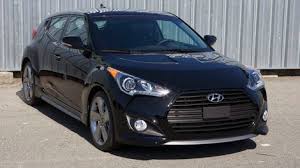 Hyundai veloster is something cleverly different in its design. 2013 Hyundai Veloster Turbo Review Review Hyundai Boosts The Veloster S Performance Roadshow