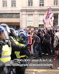 More than 100,000 anti-immigrant protesters marched through the streets of  central London, clashing with police and injuring at least 26 officers in  one of Britain's largest far-right demonstrations in its history. The