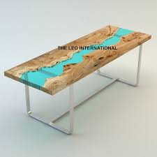 The tabletop is fully handmade out of genuine teak and provides a stable and secure surface on which you can place your drinks, vases, fruit bowls, or decorative. Epoxy Resin Coffee Table