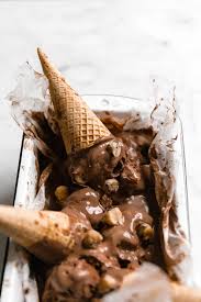 We may earn commission on some of the items you choose to buy. Double Dark Chocolate Cookie Dough Ice Cream Broma Bakery