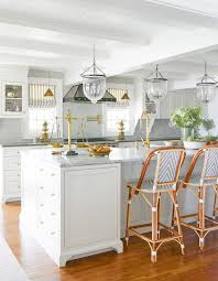 What happens to the dust? White Marble Kitchen Classic Style Bell Jars Pendants French Bistro Chairs Brass Accents The Glam Pad