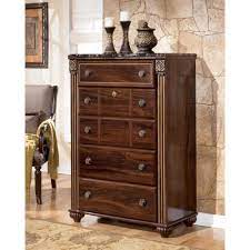 Enormous poster bed with storage footboard option. Gabriela Poster Bedroom Set W Storage Footboard