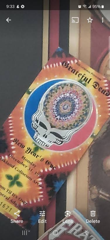 Grateful Dead New Year's Eve 1990 ticket with silver embossed stealie