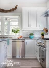 Well Appointed Cottage Kitchen Is Fitted With Stainless Steel Appliances Including A Stainless St Replacing Kitchen Countertops Kitchen Remodel Cottage Kitchen