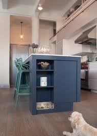 Rattan chairs and a pedestal table complement this small banquette perfect for reading the paper over breakfast or sharing a cup of coffee with friends. Kibble Time Clever Cubbies And Drawers For Your Pet Food Station Julie Co Realty