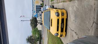Image result for Herald Yellow 1975 Subaru