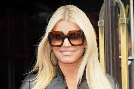 As of 2021, jessica simpson's net worth is estimated at $200 million. Jessica Simpson Models Flared Jeans Denim Jacket 6 Inch Platforms Footwear News
