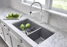 This kitchen sink is made of silgranit, a patented, certified granite composite material that is engineered to take on the toughest kitchen tasks. Precis U 1 Silgranit Anthracite Blanco