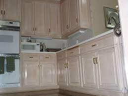 How to paint kitchen cabinets the perfect white. Pickled Wood Kitchen Cabinets Wood Kitchen Cabinets Kitchen Wood Kitchen