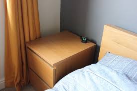 Take a tarva twin bed and make a fabulous and sophisticated diy we hacked the ikea tarva bed into a four poster bed. Wireless Charging Pad Hidden In Ikea Bedside Table Ikea Hackers