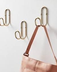 A Few Stylish Hanging Hooks Can Go A Long Way When Organizing A Closet Or Entryway Click Here To See More Of Our Bud In 2020 Home Decor Hooks Wall Hooks