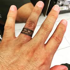 Laser tattoo removal sessions can also be extremely painful. Pin By Priscilla Ochoa On Wedding Ring Tattoos Wedding Band Tattoo Ring Tattoo Designs Wedding Ring Tattoo