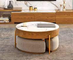 The furniture of america tanenbaum rustic round coffee table ottoman is equal parts tough and chic. This Amazing Rising Coffee Table Has 3 Integrated Ottomans That Hide Underneath It