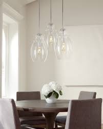 The contemporary dining room light rhythmic composition of matte brass canes makes saki suspension light an unforgettable piece in any decor alison berger's dining room lighting ideas from holly hunt suspends over two wood tables in this dining room decoration. Stunning Dining Room Lighting Fixture Ideas Capitol Lighting Dining Room Lighting Dining Room Light Fixtures Rectangular Dining Room Table