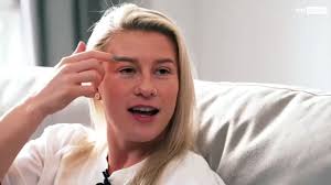 Matching tattoos, matching dogs, matching ambition. Beth England