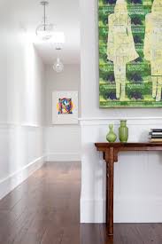 Our first attempt at chair rail ended up looking something like the picture below and this actually looks tame compared to the eight foot piece. Chair Rail