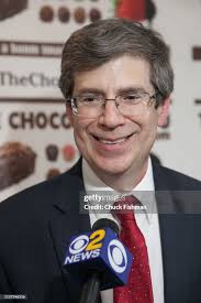 Marvin Baum, founder of Baum Image Group, is interviewed by a news... News  Photo