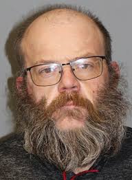 Suspect assaults, threatens officers