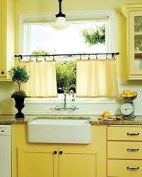 This Charming Kitchen In A 1927 Portland House Grabbed Our Attention Because Of Its Sunny Yellow Paint Check Out The Yellow Kitchen Walls Yellow Kitchen Home