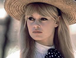 She wrapped bows around each hair section to add an even more feminine take on the carefree style. Curtain Bangs A La Brigitte Bardot Are Making A Comeback Thefashionspot
