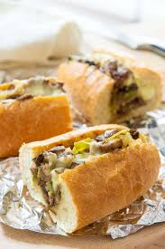 This steak sandwich is epic and incredibly simple! Cheesesteak Sandwich Easy Recipe For Gooey Cheesy Hot Lunch