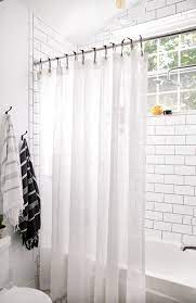 A drape is usually attached to a rod with decorative hooks, while a curtain attaches to a rod without the hooks. Bathroom Reveal Diy Shower Curtain Bathroom Decor Shower Curtain