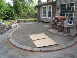 Use a mallet to secure each paver in place, and check each paver for level before how to upgrade a concrete urban patio. How To Cover A Concrete Patio With Pavers 99 Degree