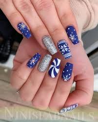 The Cutest And Festive Christmas Nail Designs For Celebration Red and white looks great as festive christmas nail or valentine nails.