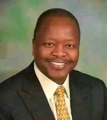 What do you remember this man with?