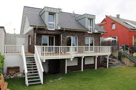 Zurück zu terrasse holzhandel gadero terrasse terrassendielen aus holz. Holzterrasse Auf Stelzen In Stommeln Zimmerei Bronnecke