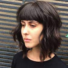 Long Shaggy Brown Bob With Texture Lengths And Full Blunt Bangs The Latest Hairstyles For Men And Women 2020 Hairstyleology Bob Haircut With Bangs Bob Hairstyles Long Hair Styles