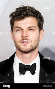 Poses at the world premiere of hi-res stock photography and images