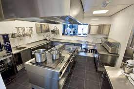 Using the same material throughout the wall, the kitchen is integrated into the total space, highlighted by a strip of marble that allows the proper functioning of its wet areas and work surfaces. 32 Community Kitchen Ideas Kitchen Layout Restaurant Kitchen Design Commercial Kitchen Design