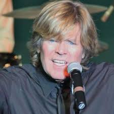 You heard of Peter Noone from Herman's Hermits? Now he sings only when the  clock strikes midday