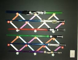 Lightsaber Display Used Accordion Hooks So Cute For A Girl S Sw Room The Wall Is Painted With Cha Boys Room Decor Kids Room Organization Big Boy Bedrooms
