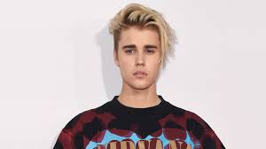 Justin bieber became a famous pop singer after his singing videos were discovered on youtube. Justin Bieber Proves He Needs A Haircut With One Photo Mtv