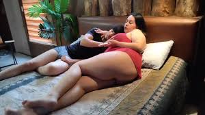 Mom is alone in her bed watching a movie and her stepson makes her end up  fucking hard