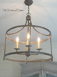 Old style wood ceiling fans with white glass lamps. The Essence Of Home Old World Lighting